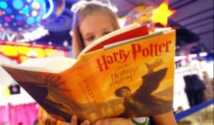 Child reading Harry Potter