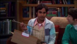 Raj holding a wand