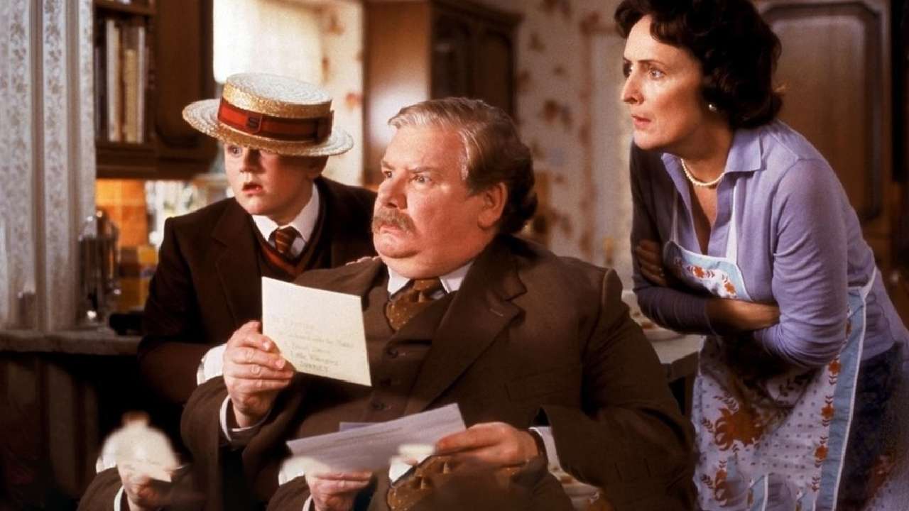 Concerned family reading a letter.