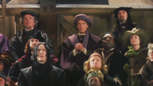 Wizards gathered in medieval attire. 