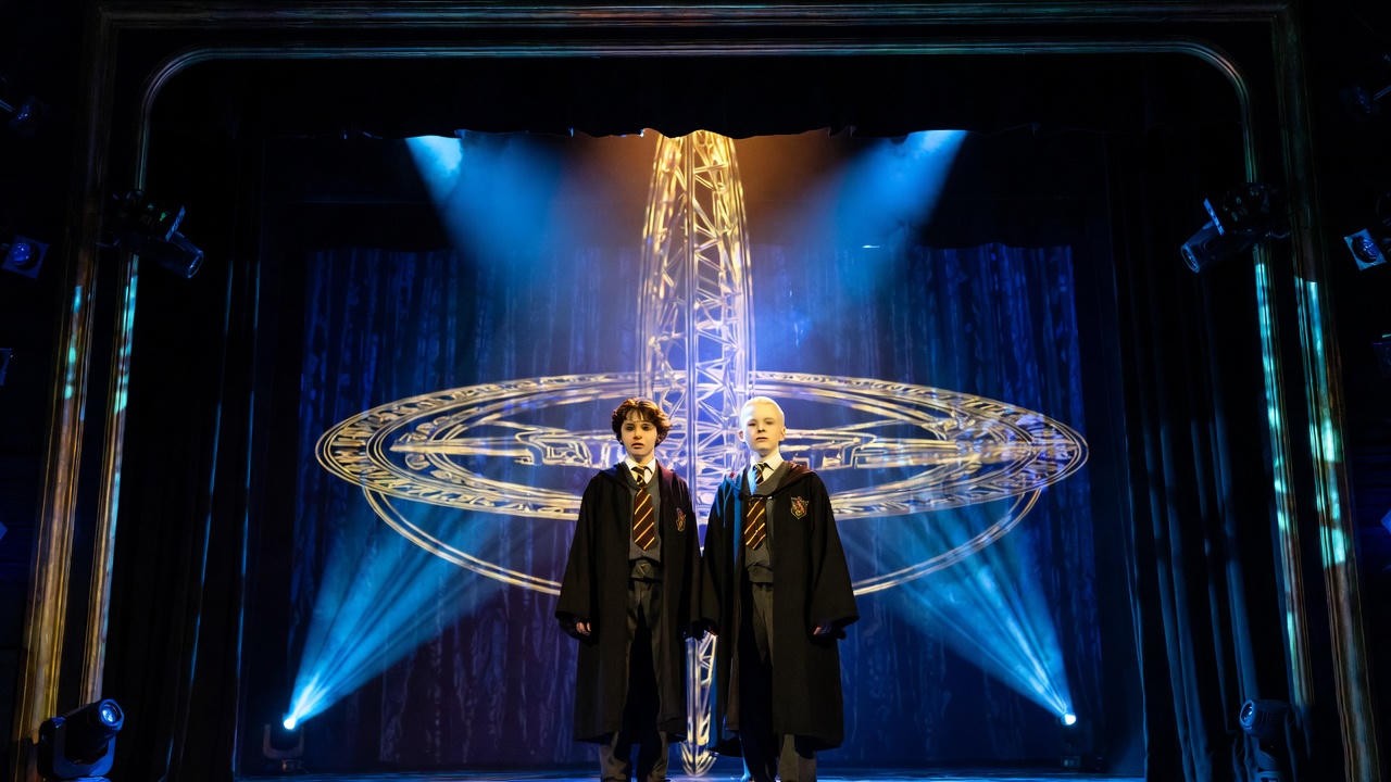 Albus Potter and Scorpius Malfoy on stage in Harry Potter and the Cursed Child theatrical performance with magical effects
