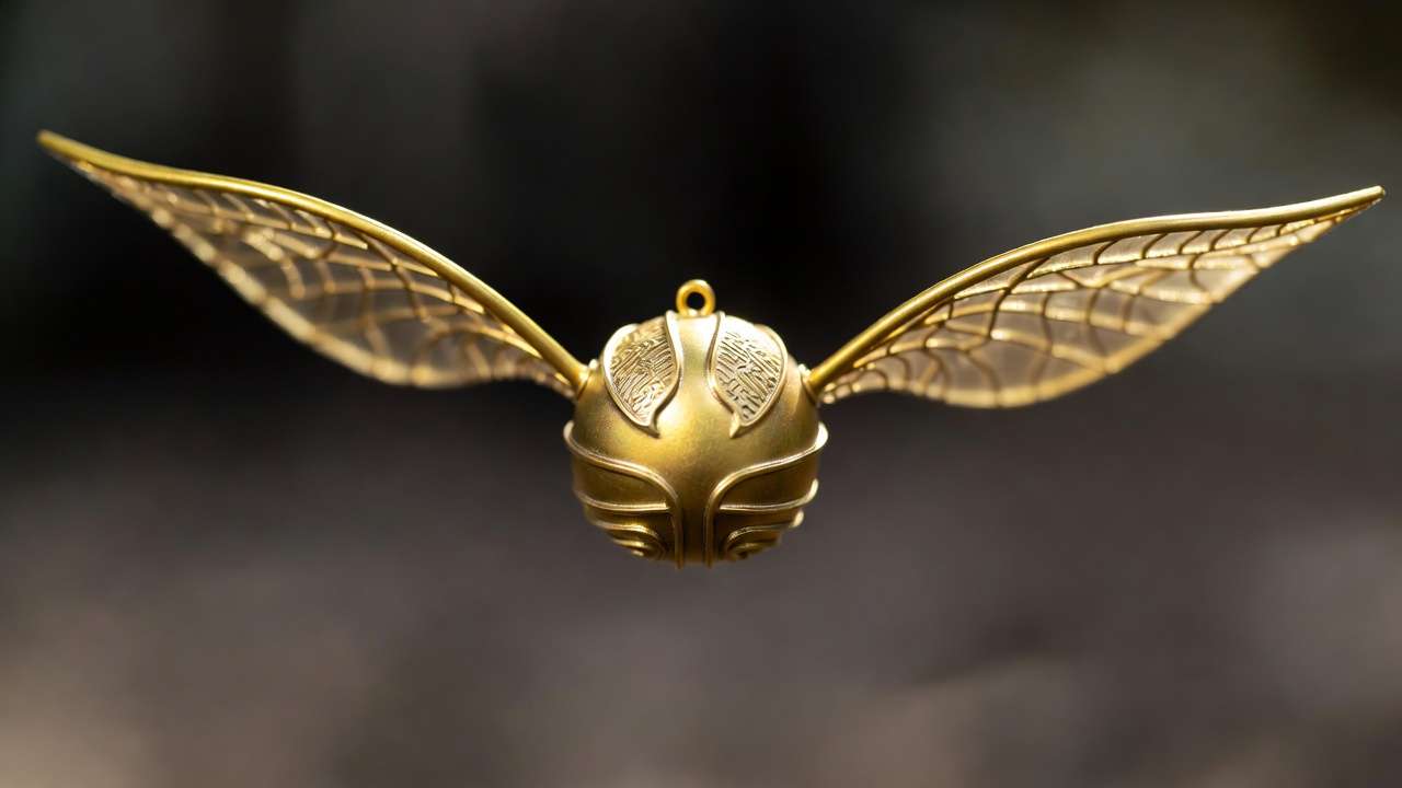 DIY golden snitch ornament with wings Harry Potter craft decoration