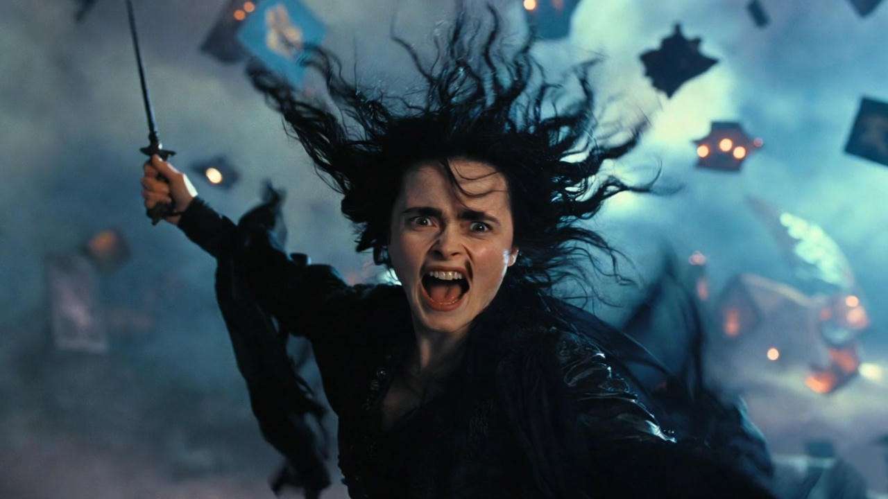 Helena Bonham Carter as Bellatrix Lestrange dueling with wand in Department of Mysteries Harry Potter scene.