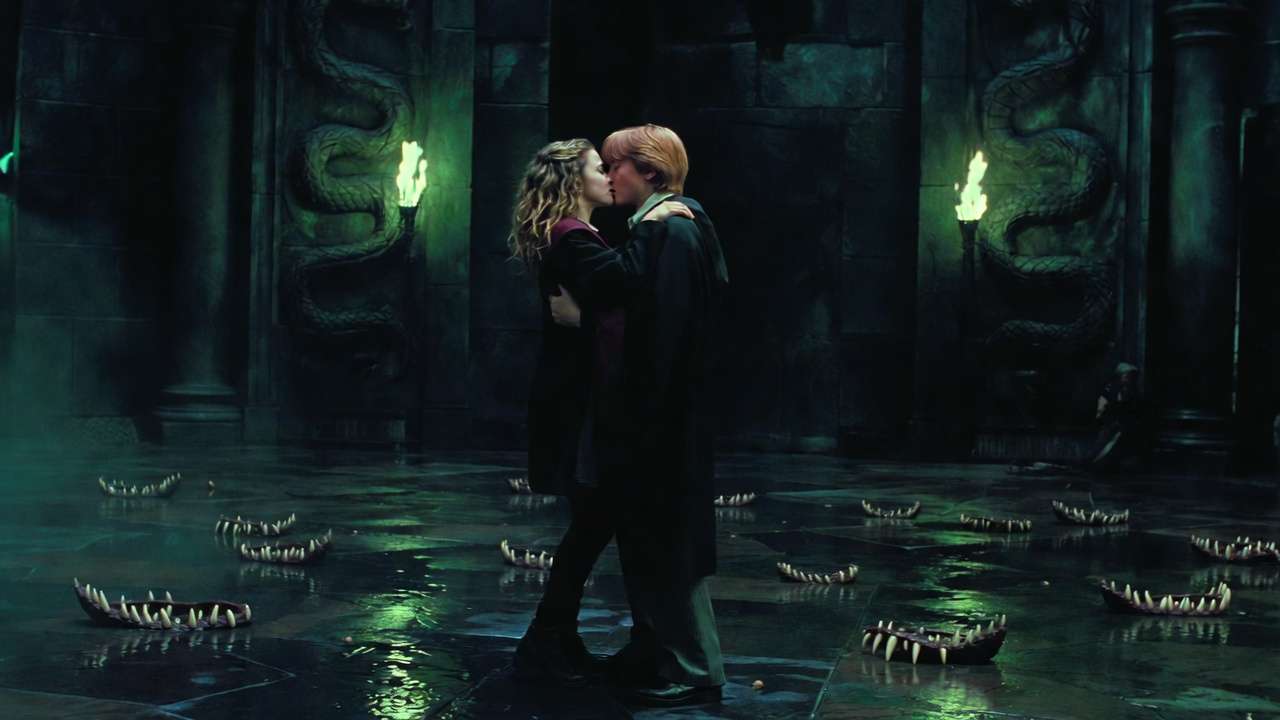 Ron and Hermione first kiss in the Chamber of Secrets book scene Deathly Hallows passionate embrace