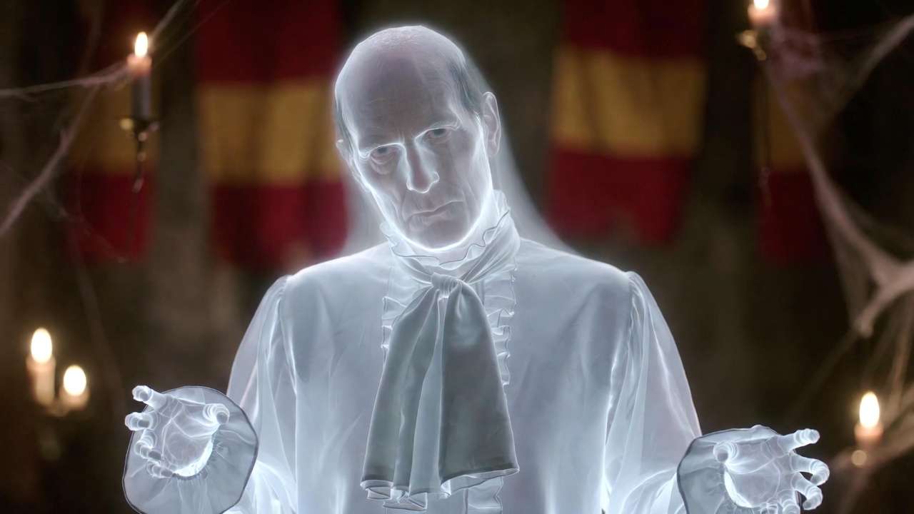 Nearly Headless Nick as portrayed by John Cleese in Harry Potter films, translucent ghost in Hogwarts setting