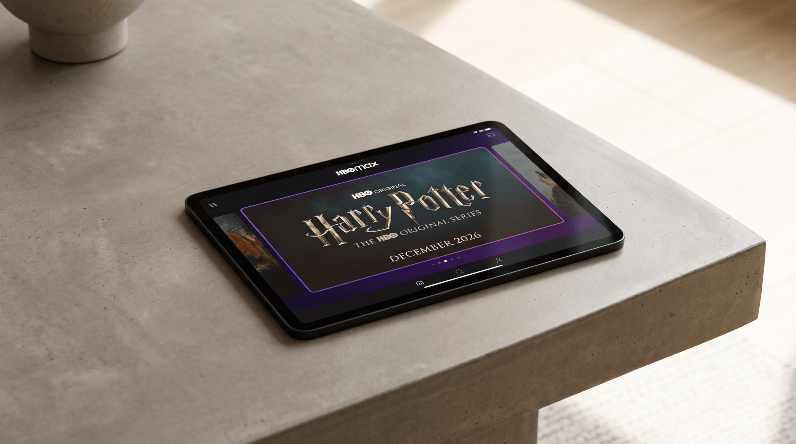 A tablet displaying the Max streaming service interface with the official Harry Potter HBO original series announcement banner.