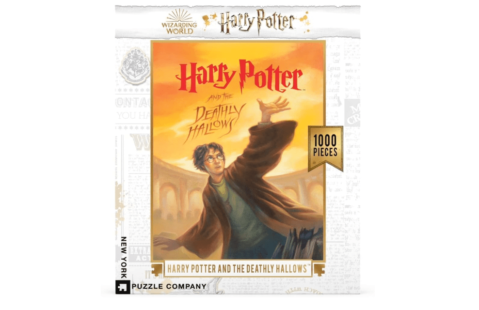 New York Puzzle Company - Harry Potter Deathly Hallows - 1000 Piece Random Cut Jigsaw Puzzle for Adults by Mary GrandPré